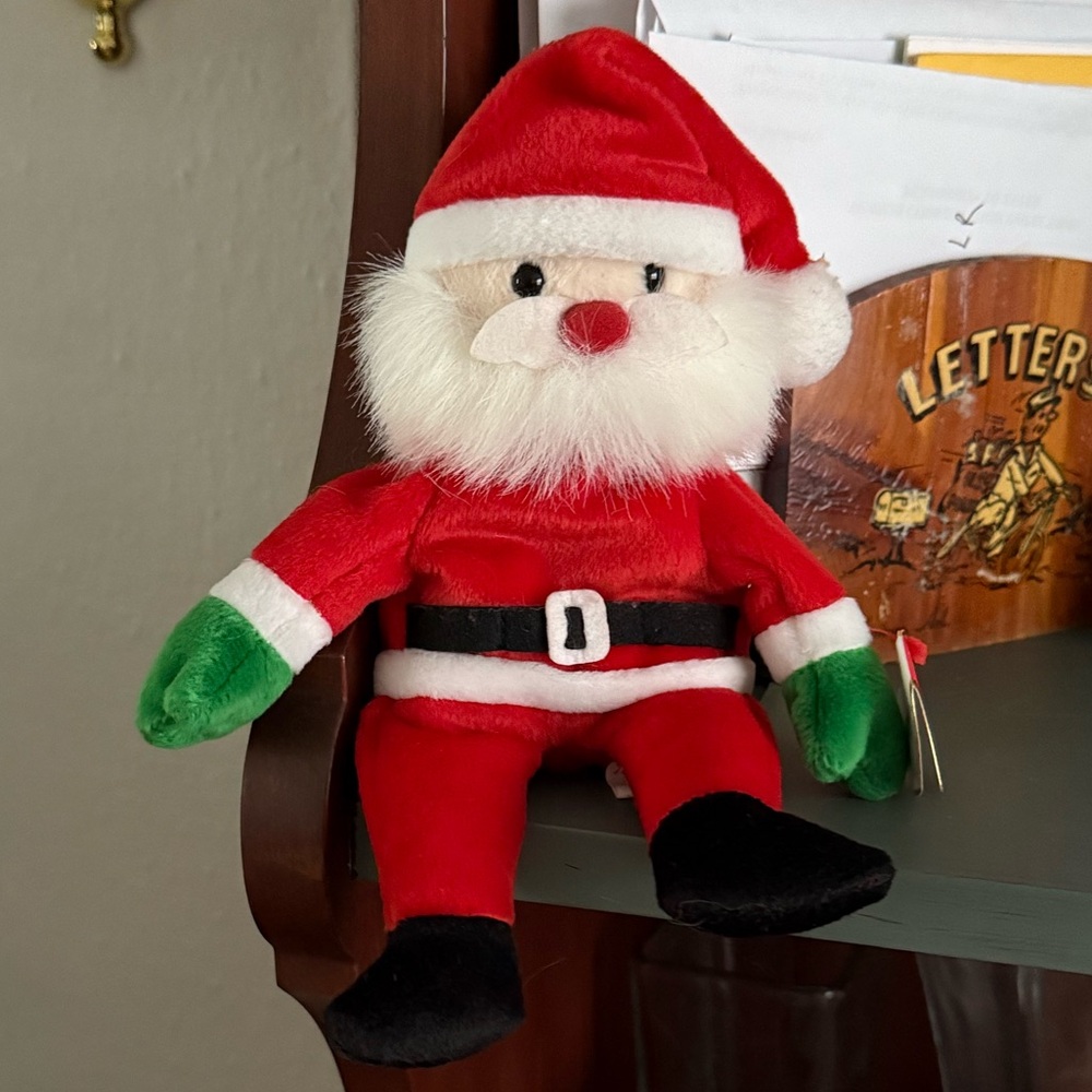 1998 “Santa” beanie baby. Perfect condition with tags. Collectors item.